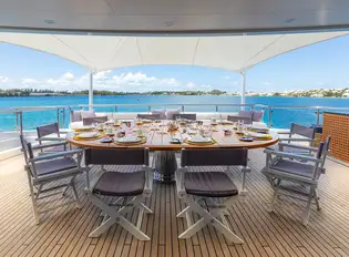 Open air dining on the upper deck aft
