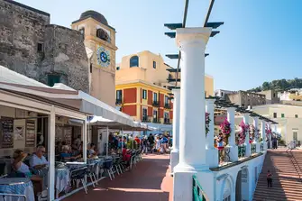 Cafes line the Piazzeta di Capri with views across the Bay of Naples