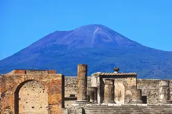 The ruins of the city lie in the shadow of Mount Etna