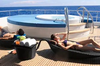 SUNONE - The raised jacuzzi and sun lounging space aft on the sun deck