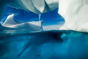 An iceberg is an awesome sight, seeing it from below is transformative