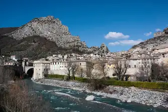 Entrevaux, positioned on a rocky outcrop at a bend in the Var River, has been settled since the 11th century
