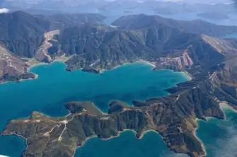South Islands' Marlborough Sounds are home to prestigious vineyards and mussel farms