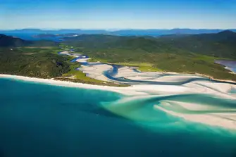 Experience the extraordinary natural beauty of Whitehaven Beach in the Whitsundays