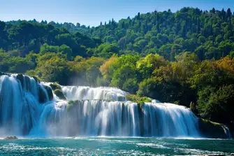 Krka National Park features seven Krka River waterfalls including the photogenic Skradinski Buk falls