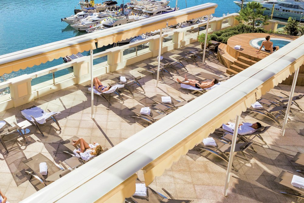 The bar has its own outdoor terrace overlooking the Mediterranean