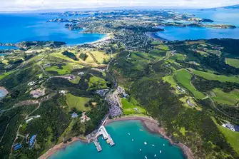Close to Auckland, Waiheke Island is home to vineyards, olive groves, beautiful beaches and chic dining