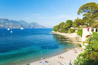 Paloma Beach looks across the Rade de Saint-Hospice to the picturesque town of Eze from the eastern tip of Saint-Jean-Cap-Ferrat