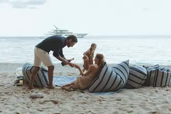 Enjoy Champagne on the beach