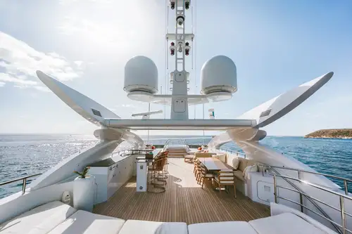 Sun deck bar, dining area, jacuzzi and sunpads